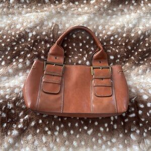 Aldo brass buckle bag